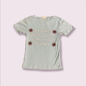 Urban outfitters blue tee! “In a world you can be anything be kind”